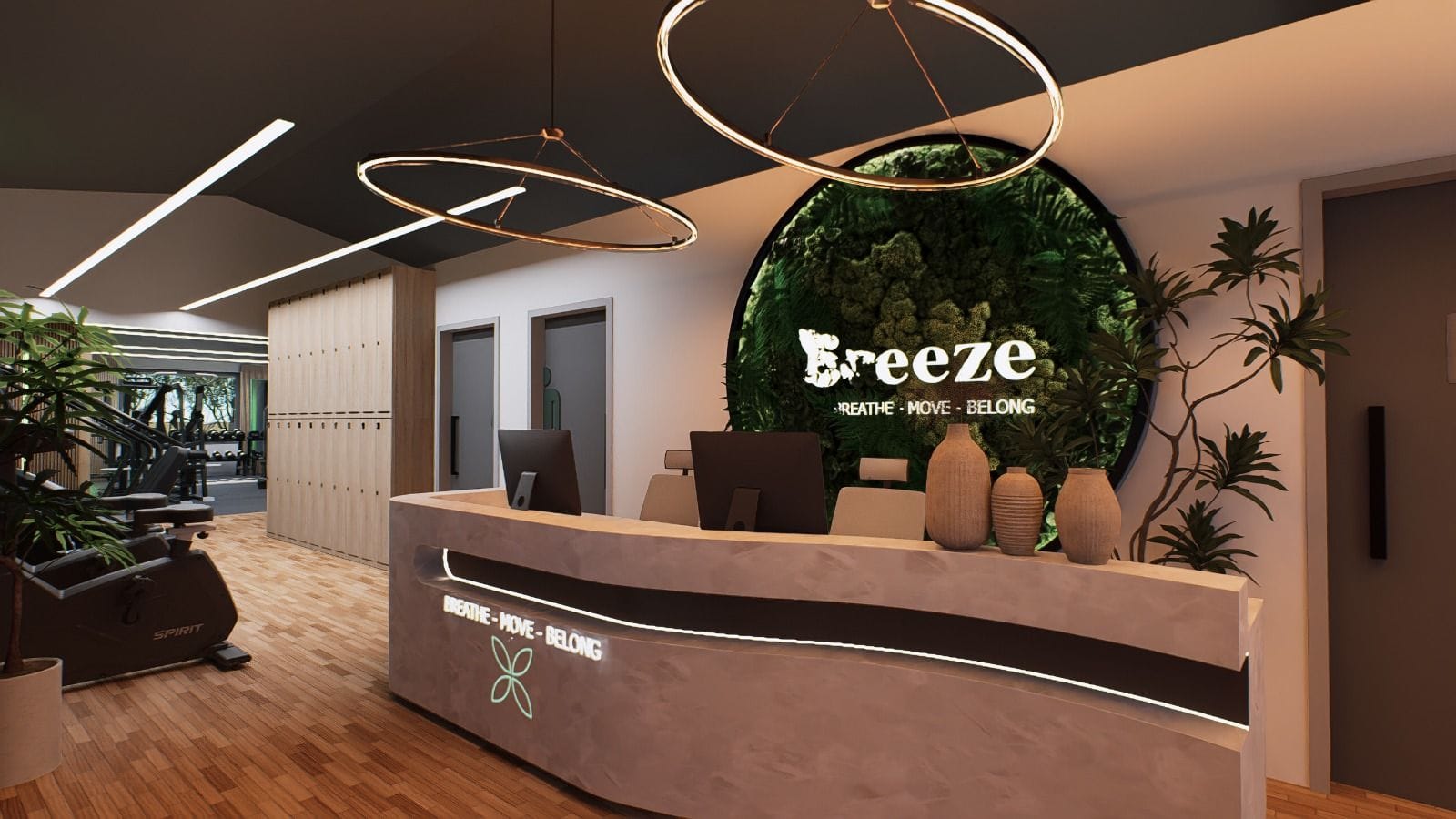 The Breeze reception with the living moss wall and curved desk, gym beyond